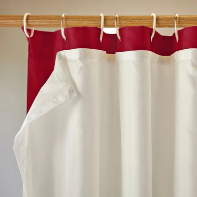 closeup  lined linen shower curtain brick red