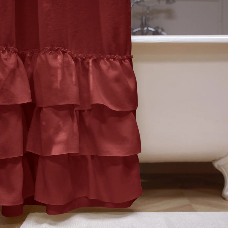 close up ruffles on shower curtain brick red