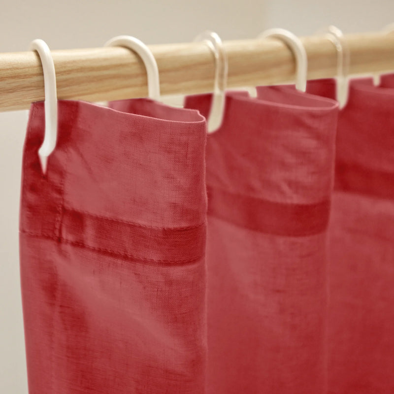 closeup linen shower curtain top brick red