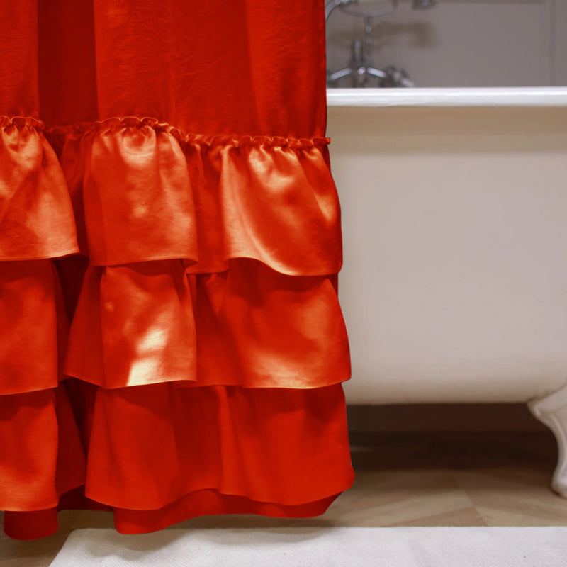 close up ruffles on shower curtain coral