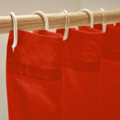 closeup linen shower curtain top coral