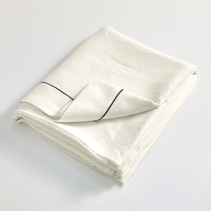 Bourdon linen flat sheet folded ivory