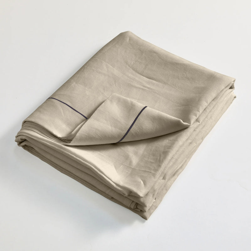 Bourdon linen flat sheet folded beige